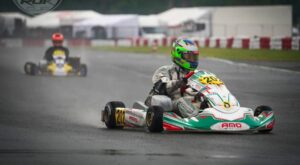 Alex Rogowski numer 202 AMO Racing Team w deszczu podczas Kartingowych Mistrzostw Polski w Bydgoszczy